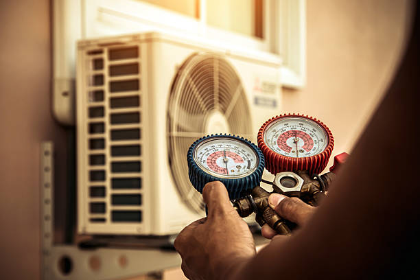 Professional Air Conditioning Service technician working in Henrico, VA